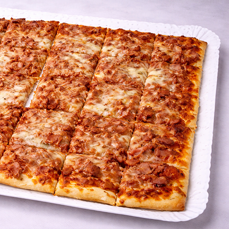 23Pizza con jamón y cebolla caramelizada